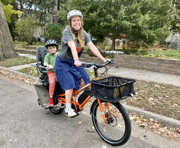 Mary Blitzer and child on a cargo bike