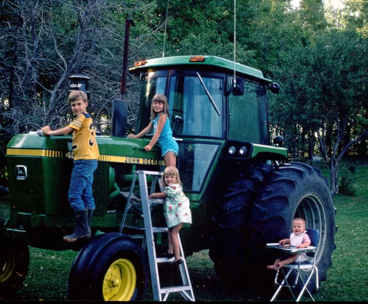 Connie and her siblings doing a special farm chore for Father’s Day