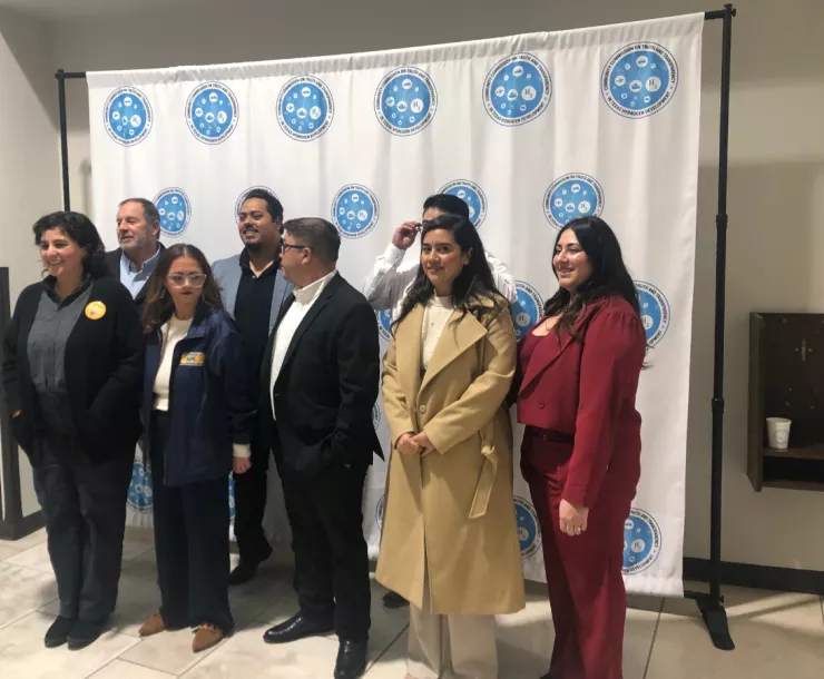 hydrogen hub meeting, people in front of backdrop