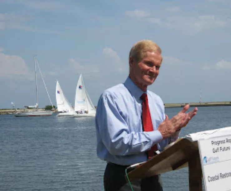 Nelson applauding with sailboats 4-20-12.jpg