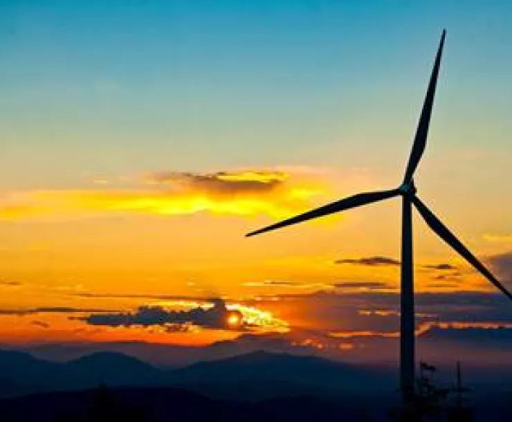 Wind turbine at sunrise.jpg