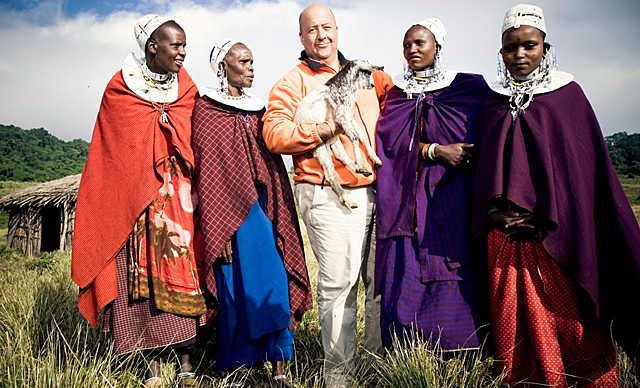 Andrew with tribe women in Ngorogoro Crater, Tanzania. | Courtesy of the Travel Channel