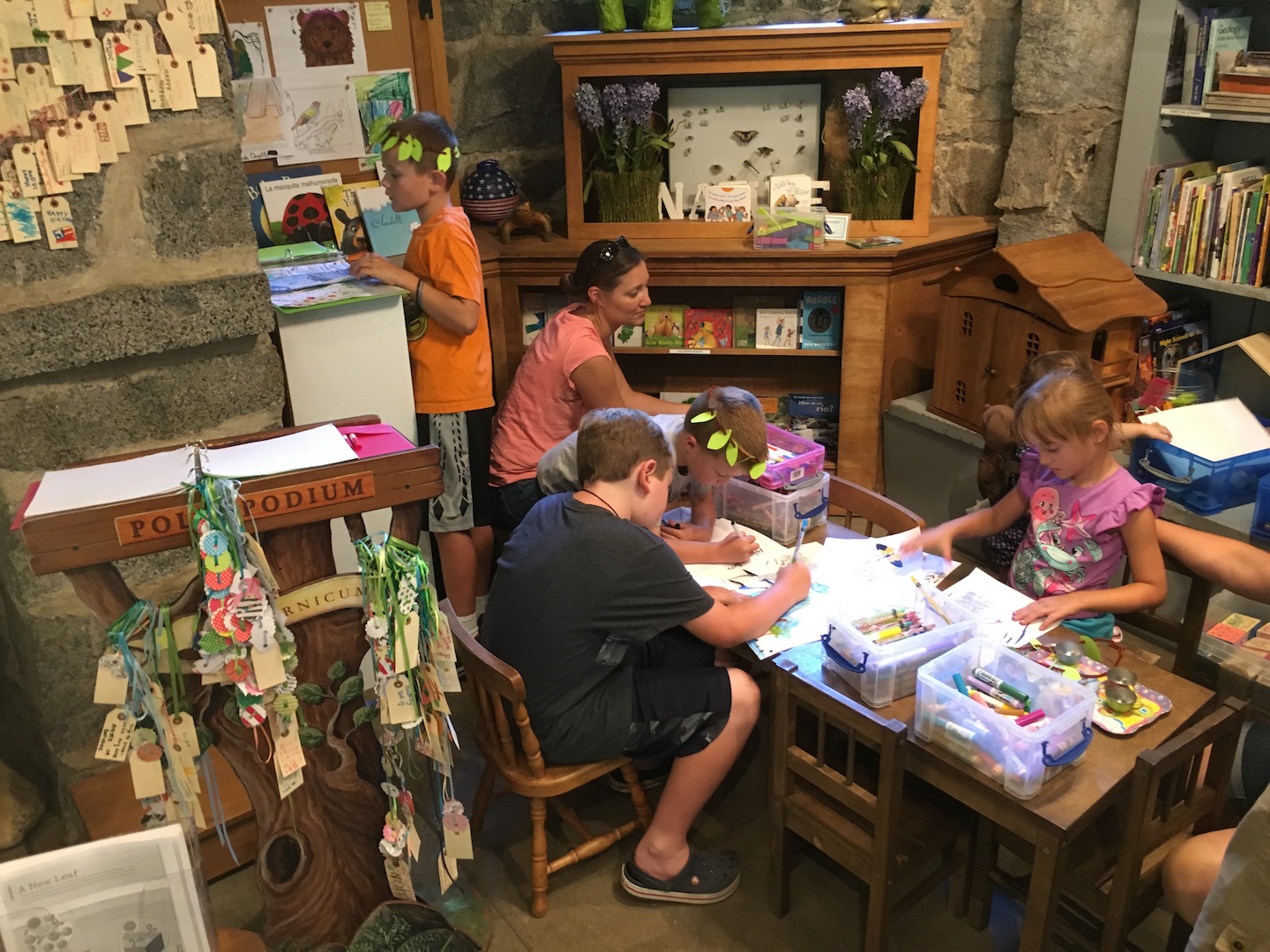 Kids making Tree halos and coloring in Yosemite Heritage Center Children's Corner