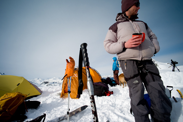 Mikey Nixon enjoys a well-earned midmorning coffee break after a 4 a.m. hike to a remote spine for a descent at first light.